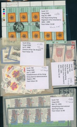 100+ identified postally used stamps sorted and in glassines